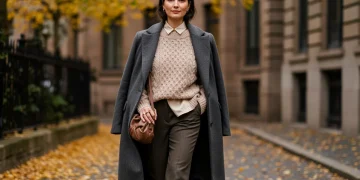 Woman in stylish layered fall winter 2025 fashion outfit
